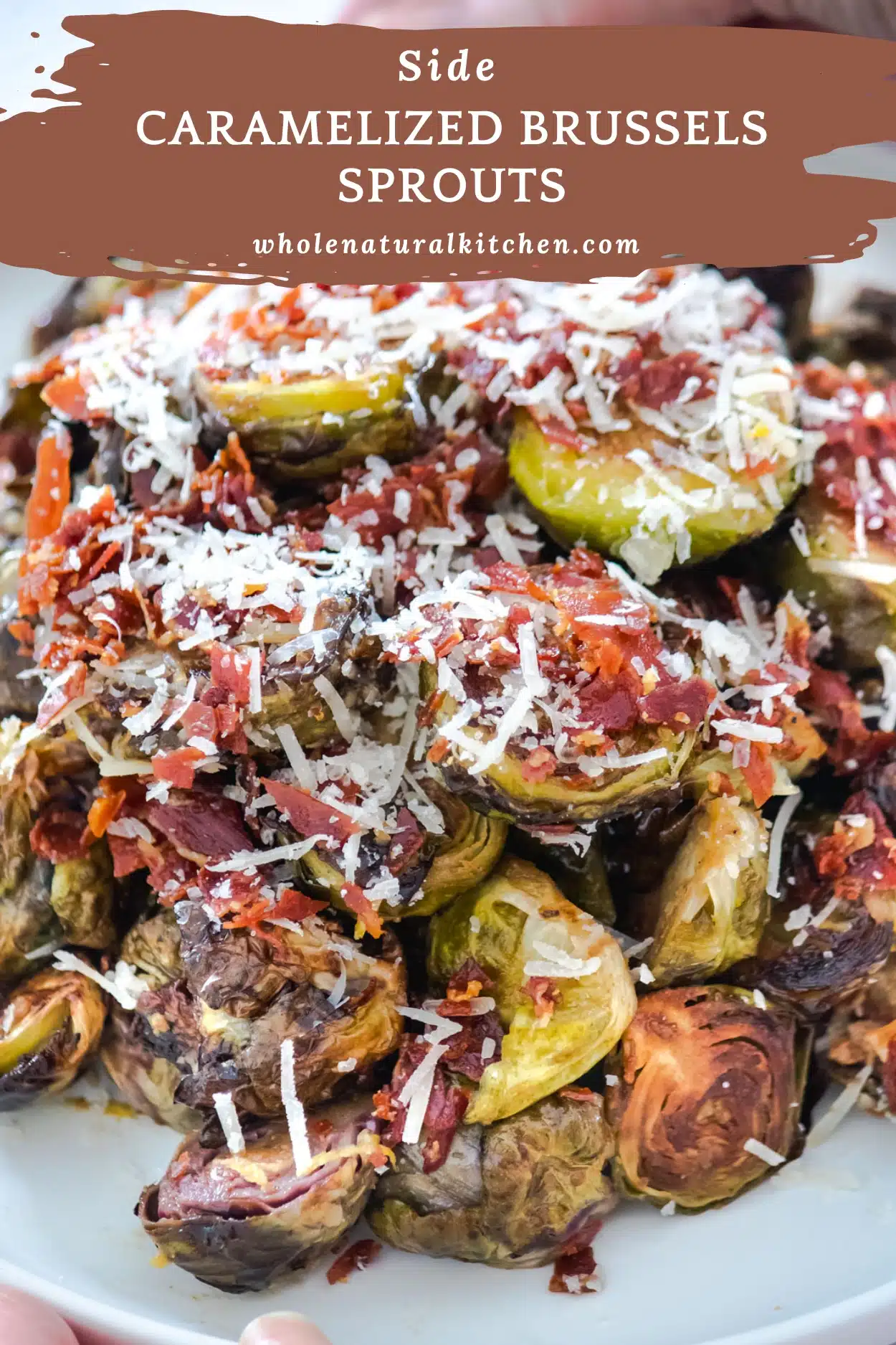 A Pinterest Poster image showing the name of the recipe at the top along with the website name, and a close up of the cooked sprouts on a plate filling the rest of the image. They've been sprinkled with cooked prosciutto and grated parmesan cheese.