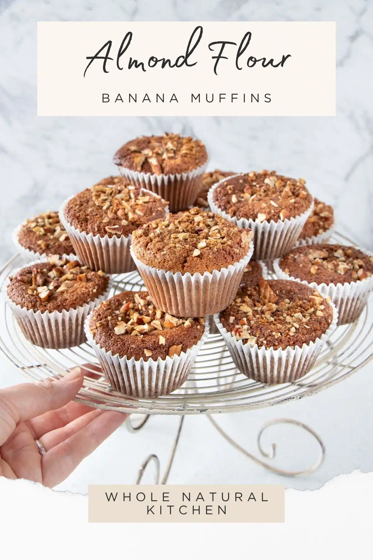 Pinterest poster with the recipe name above, website name below, and a cake stand of muffins in the middle.